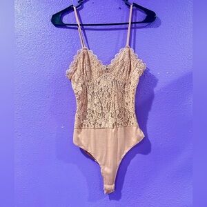 Peach color body suit